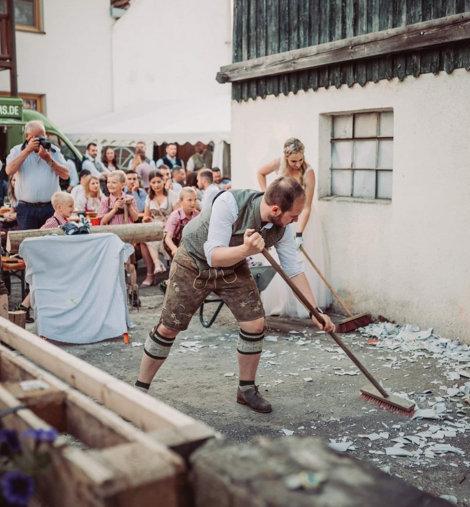 the-German-Polterabend-tradition-involves-guests-smashing-porcelain-plates-before-the-wedding-to-ward-off-evil-spirits-and-bring-good-luck