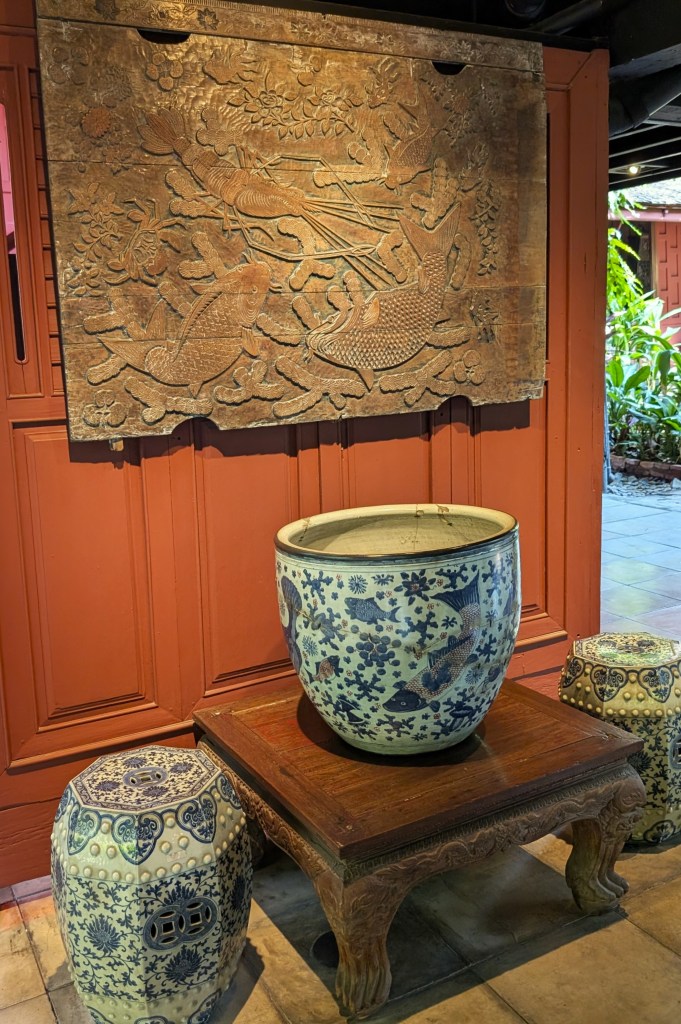 Decorative panel and ceramics at Jim Thompson House
