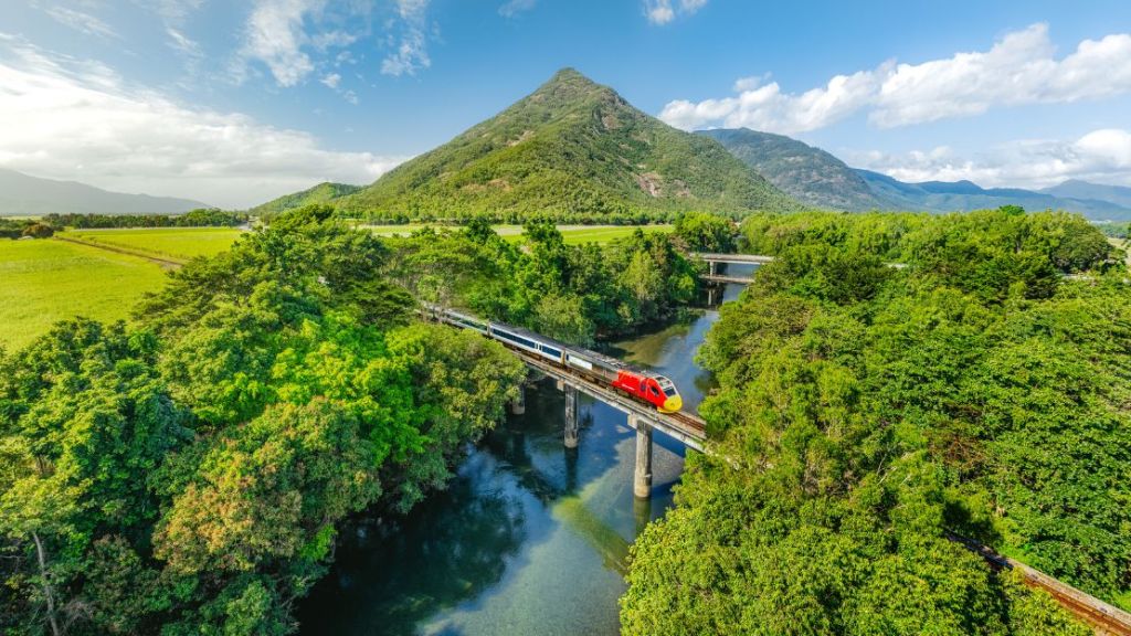 Crossing the Mulgrave River in Queensland on trail, reef and rainforest discovery tour